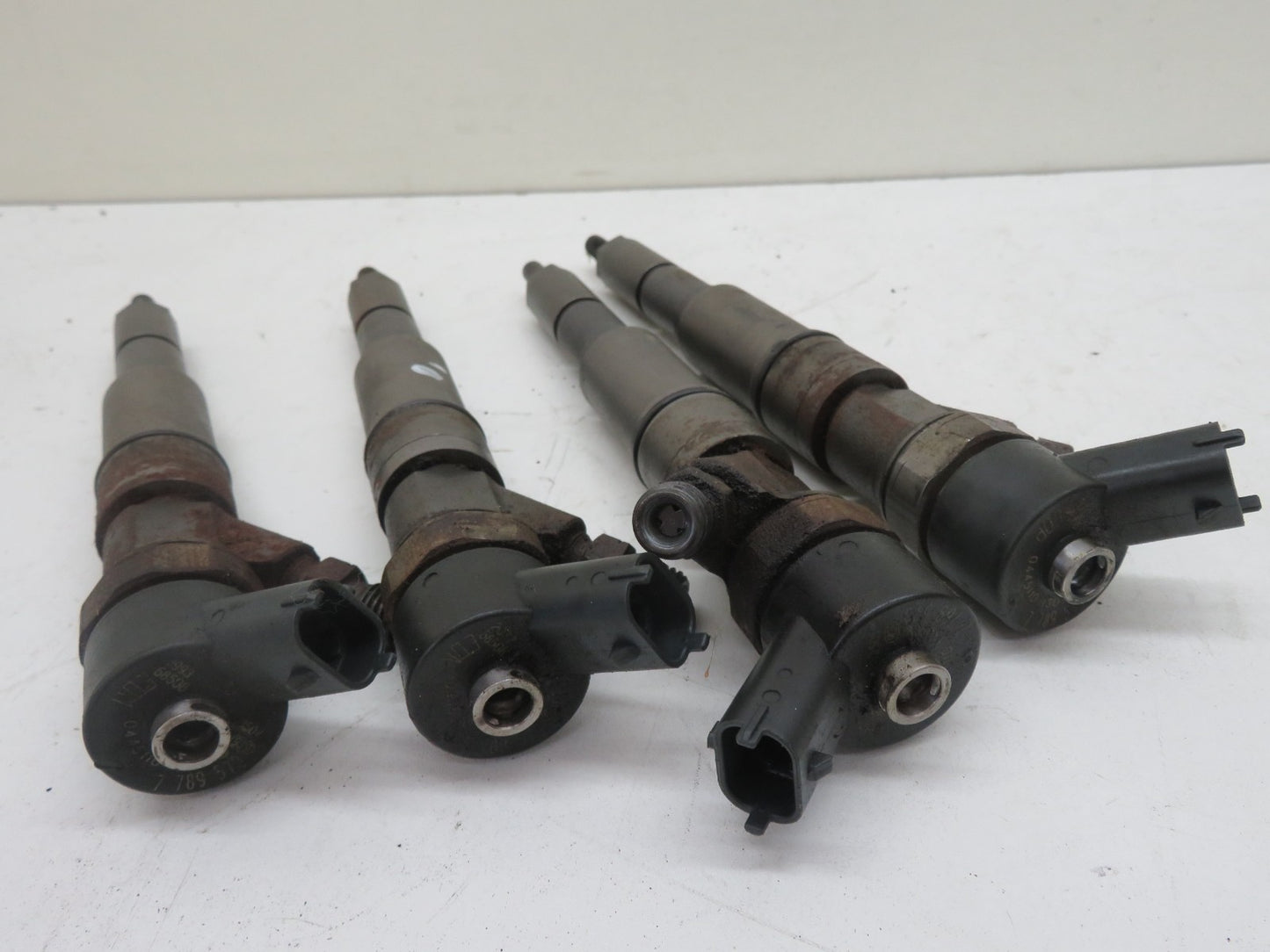 LAND ROVER FREELANDER 1 DIESEL FUEL INJECTORS X4 7789573 1997-2006 1500-10