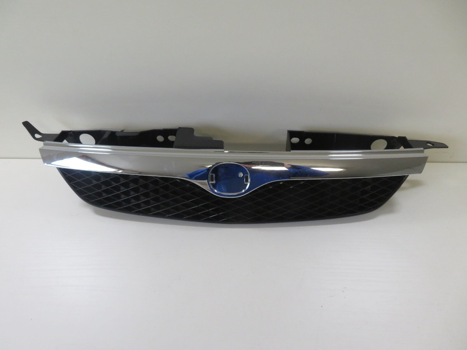 FRONT GRILLE FOR MAZDA 323 MZ07073GA FOR YEARS 1999-2000