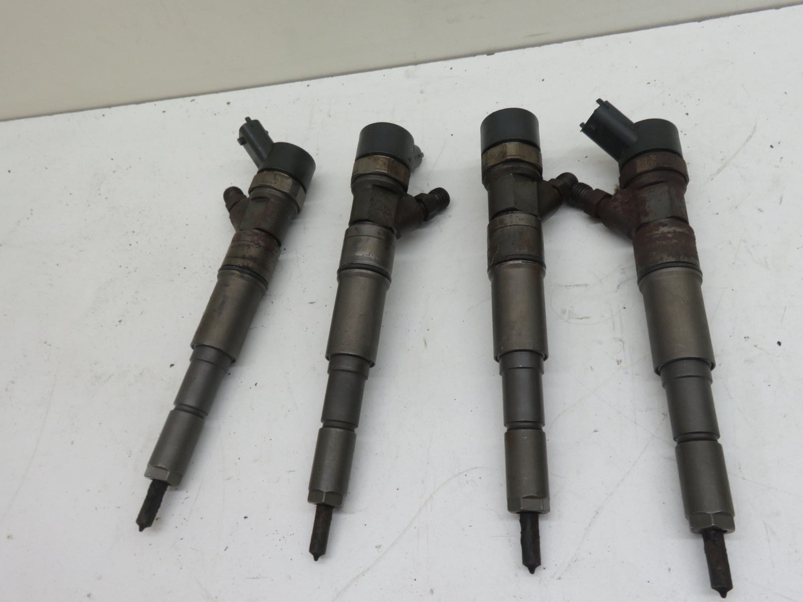 LAND ROVER FREELANDER 1 DIESEL FUEL INJECTORS X4 7789573 1997-2006 1500-10